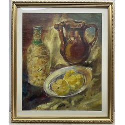 Pinchus Krémègne (Belarusian/French 1890-1981): Still Life of a Stoneware Jug Bottle and Fruit, oil on canvas laid on board signed 53cm x 43cm 
Notes: Krémègne was a Lithuanian Belarusian Jewish-French artist, primarily known as a sculptor, painter and lithographer. He was a native of Zhaludak near Lida, now Belarus, and was a friend of both Chaïm Soutine and Michel Kikoine. He studied sculpture at the Vilnius Academy of Art, and died at Ceret France.