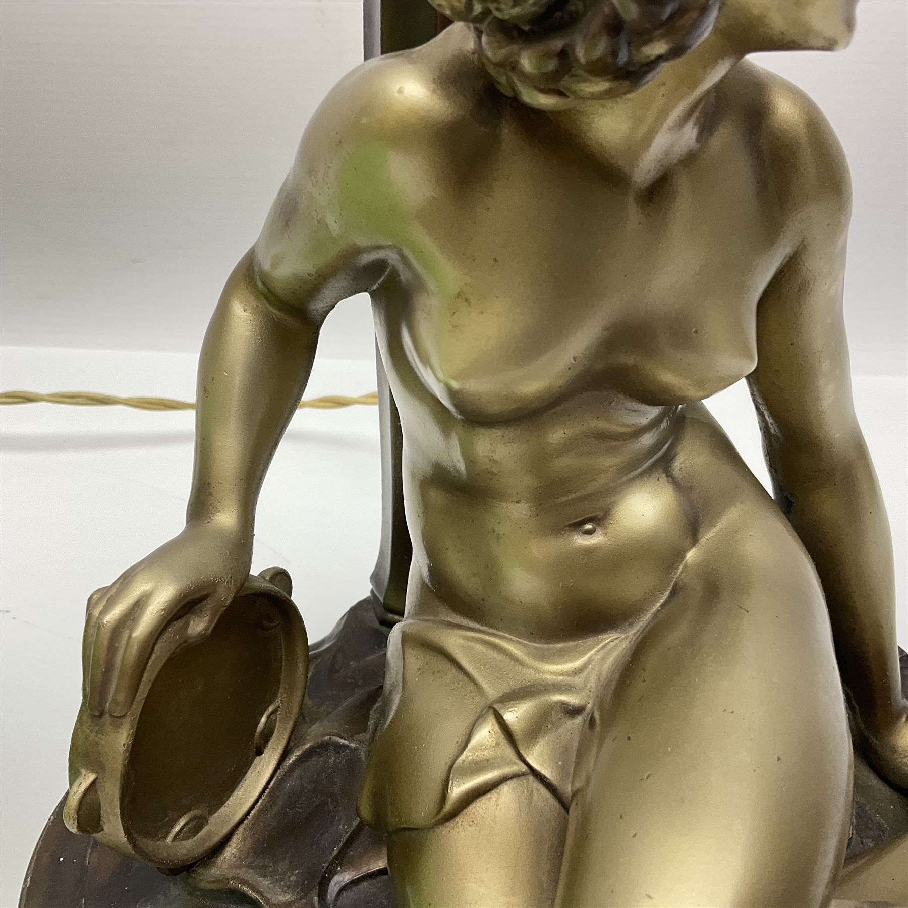 Art Deco style bronzed and gilded spelter figural table lamp with green Uranium glass shade; H48cm, another table lamp; and a bisque group