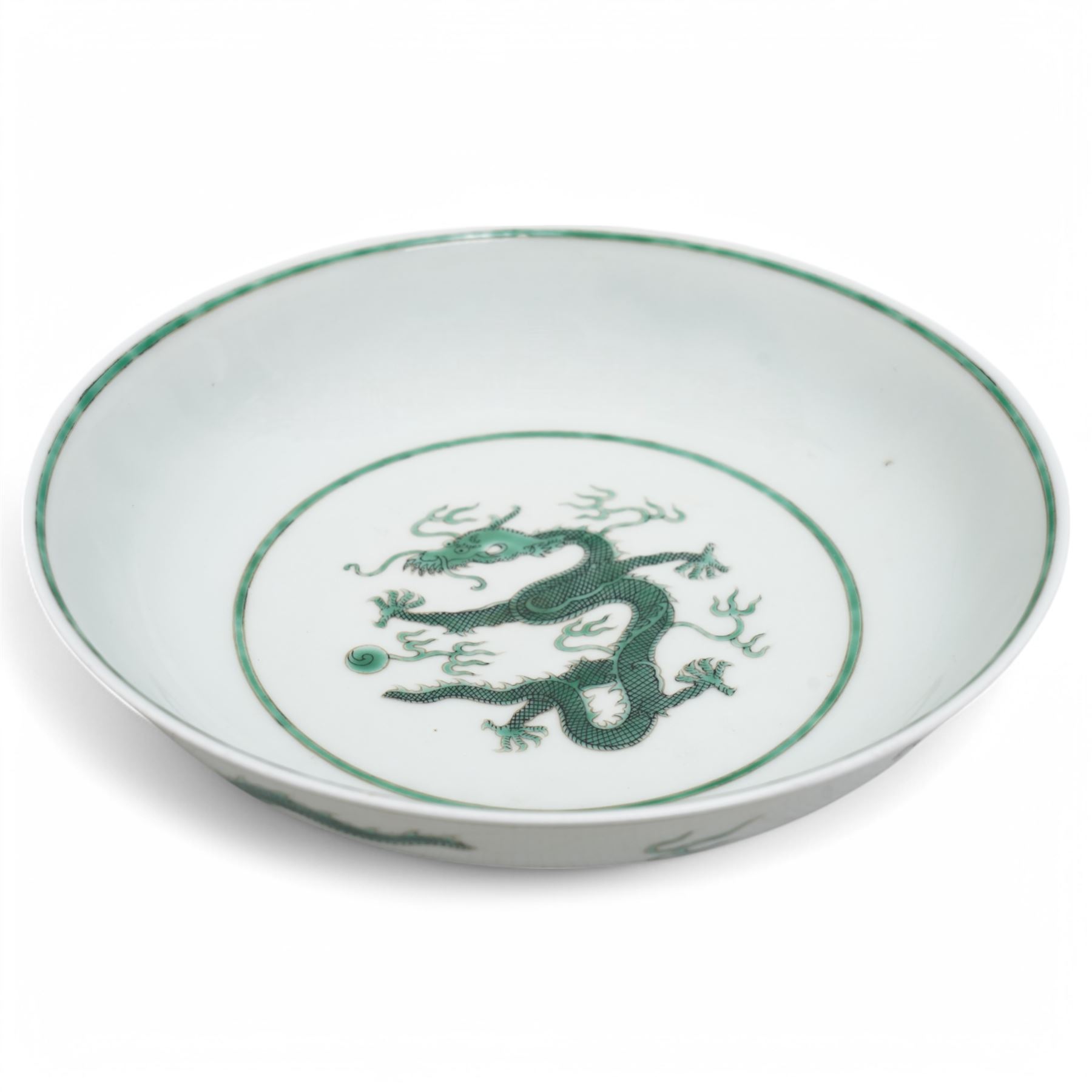 Chinese Guangxu period green and white bowl decorated with dragons on a scaled ground, character mark to base D18.5cm