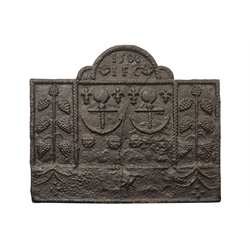  Large stepped arched cast iron fire back, relief cast with a date 1588 and initials IFC above two anchors enclosed by stylised foliage within rope twist borders, H87cm, W105cm  