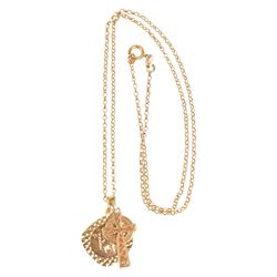 Gold St Christopher's pendant necklace and a gold cross pendant, all 9ct 