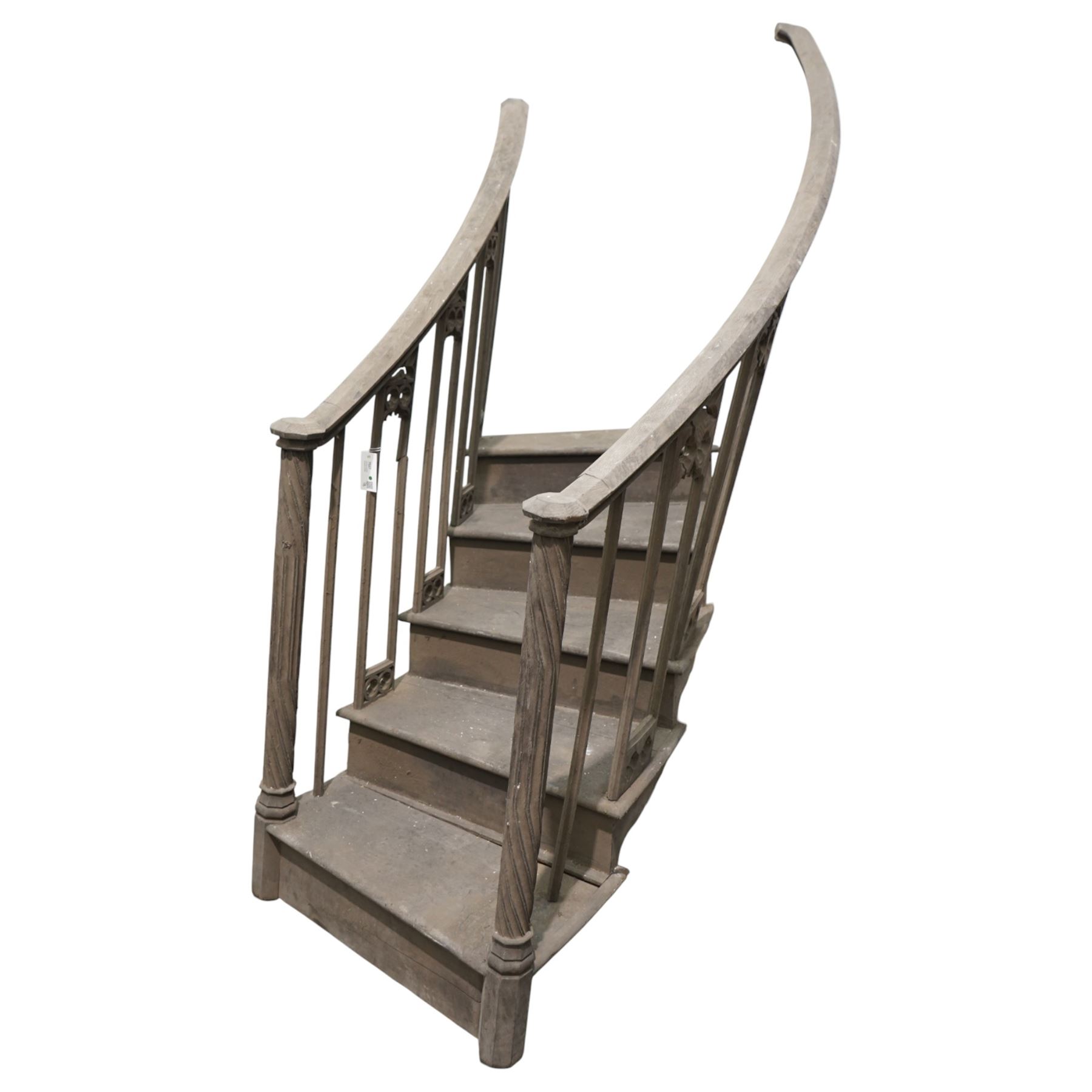 Architectural Salvage - 19th century oak five tread pulpit staircase of curved design with spiral carved pillars and pierced side panels with various additional matching pieces
Note: Removed in the 19th century from the church in the grounds of a private Yorkshire estate 
Provenance: property of a Nobleman