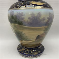 19th century Vienna style porcelain 'Musik' garniture, the central vase of baluster form with domed cover flanked by two smaller vases with twin curved gilt handles to short neck, each decorated with classical figural vignettes between blue borders heightened with gilt, H33.5cm