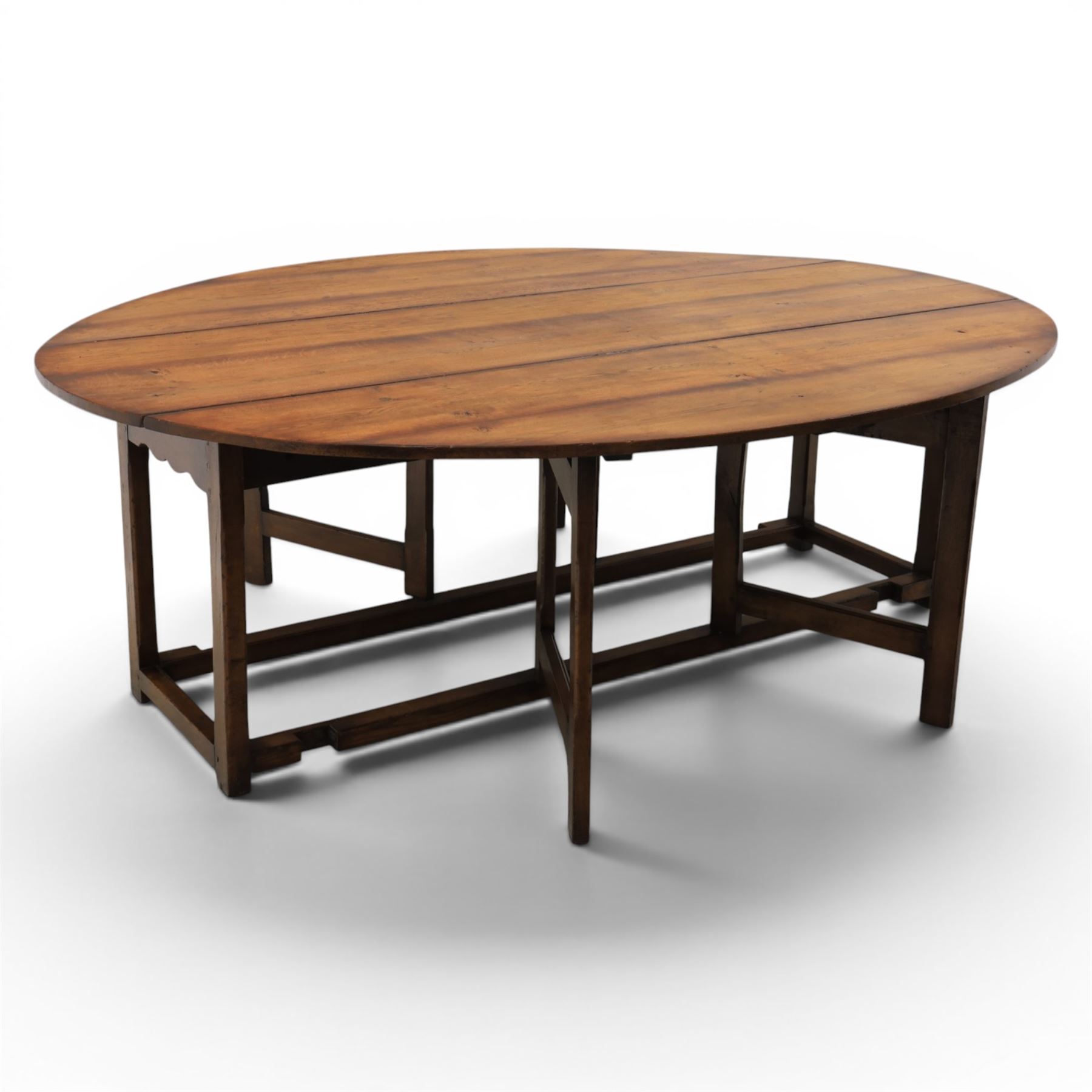 Large 18th century style oak wake table, with drop leaves and gateleg action on turned supports extends to 178 cm 