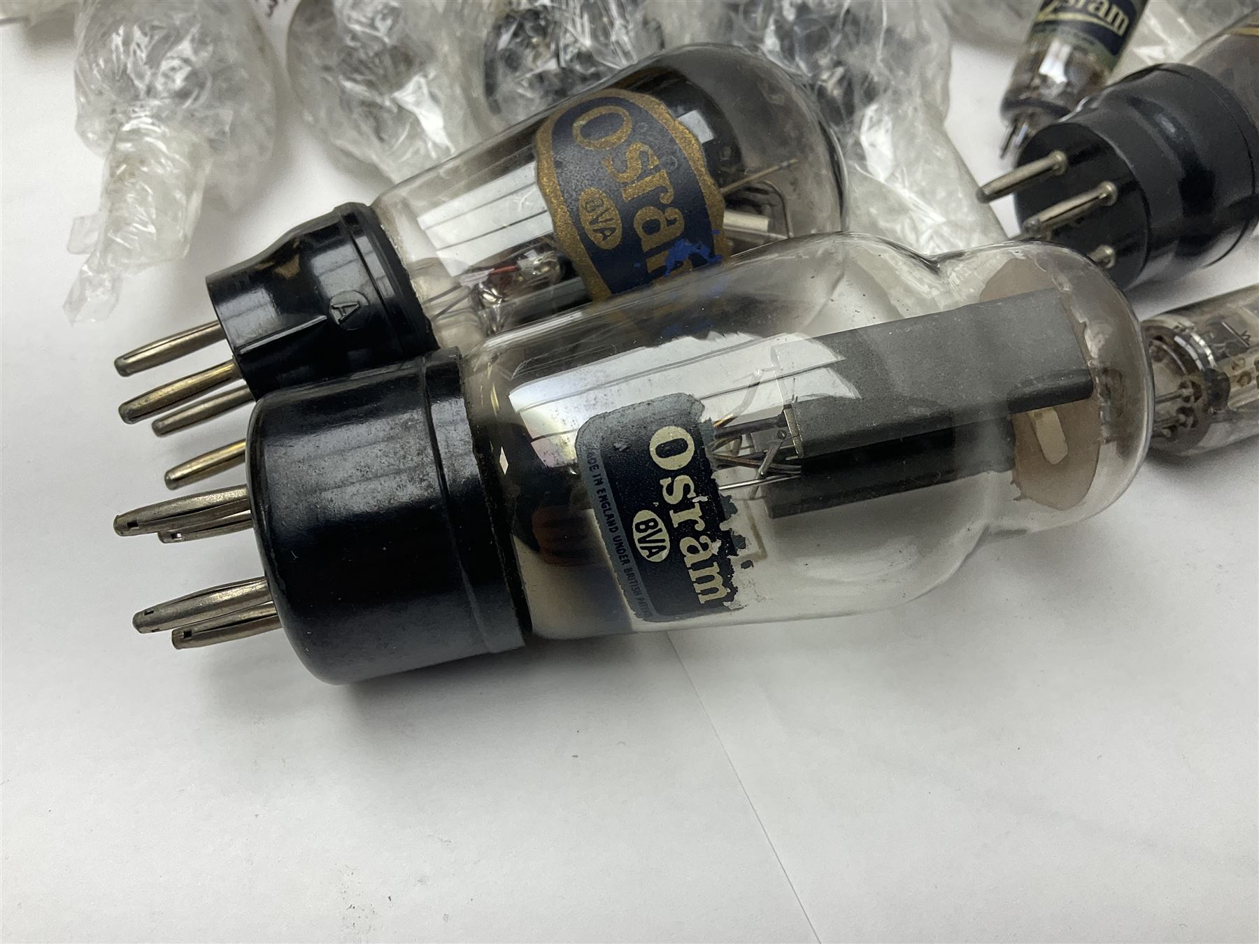 Collection of Osram, Elpico, Sylvania and similar thermionic radio valves/vacuum tubes, including P2, L21, DH77 GK9, U14 and PCLl86, approximately 19 as per list, unboxed