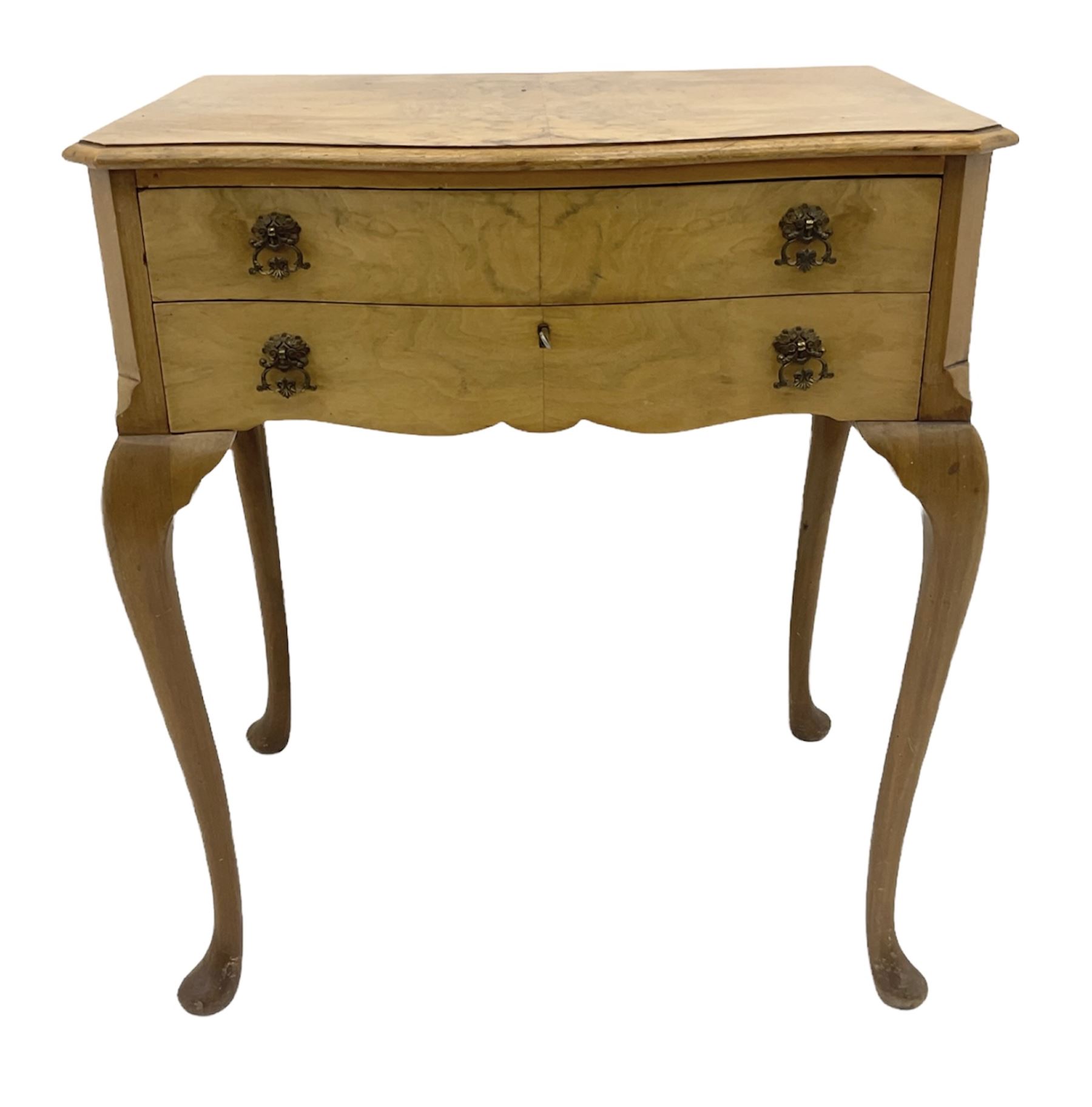 Canteen of Robert F. Mosley Rusnorstain silver-plate cutlery, eight settings- complete, in walnut two drawer canteen table on cabriole legs 