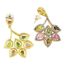 Pair of silver and silver-gilt tourmaline and diamond earrings, each stud set with seven pear cut tourmalines including green and pink, each surrounded by rose cut diamonds, total tourmaline weight approx 4.50 carat, total diamond weight approx 1.80 carat