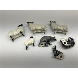 A Beswick Badger family comprising male, female and cub, together with Beswick Sheep family, comprising ram, ewe and lamb, plus a further ram. 