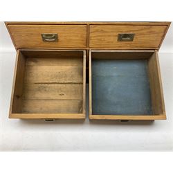 Pine tabletop apprentice type chest, with six drawers and brass recessed handles, W56cm, D27cm, H31cm, and a pine glazed cabinet