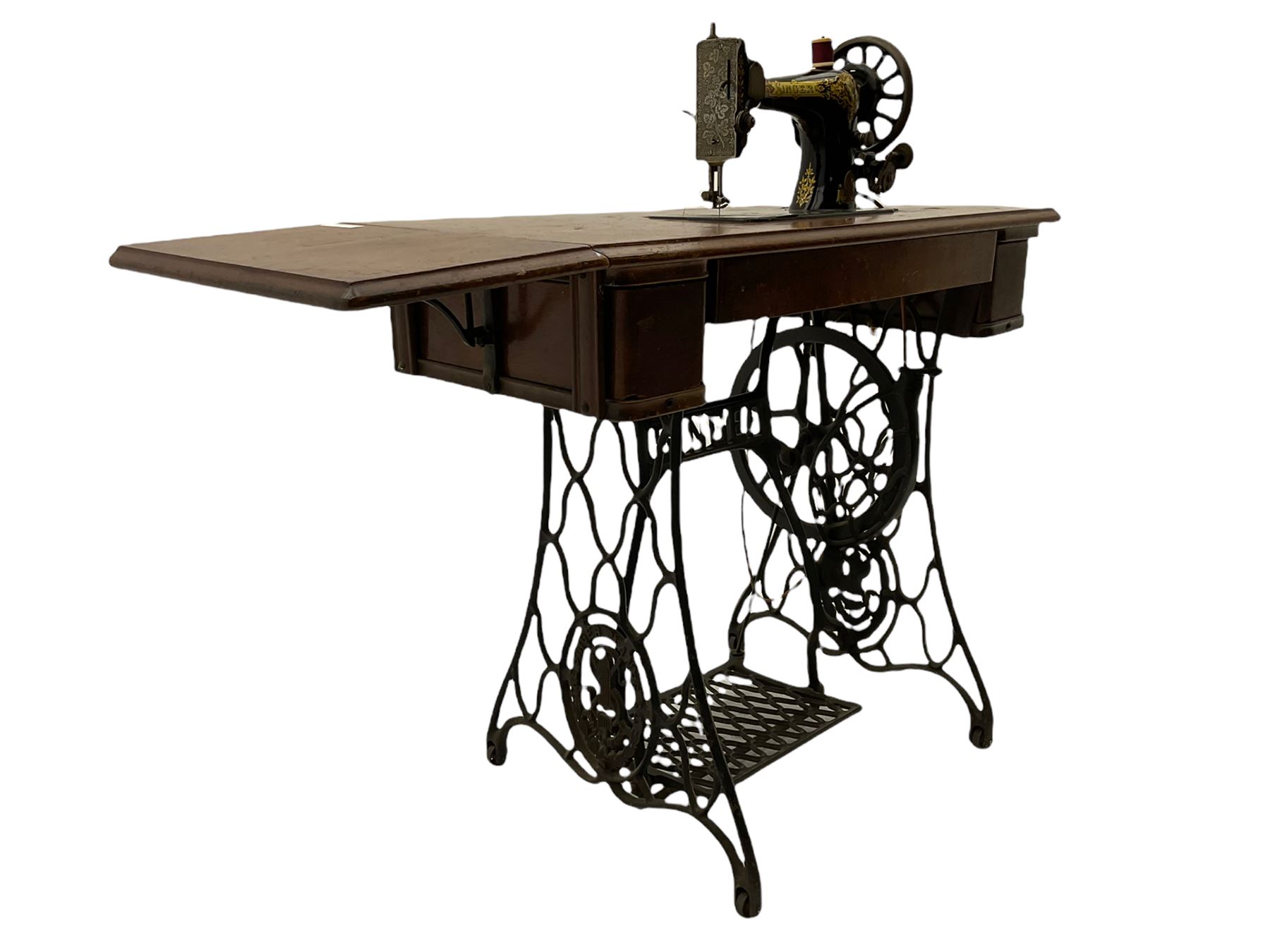 Singer - walnut and cast iron treadle sewing machine
