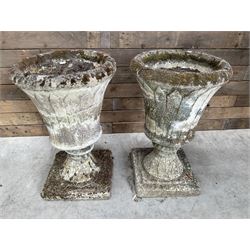 Pair of Regency design weathered cast stone garden urns