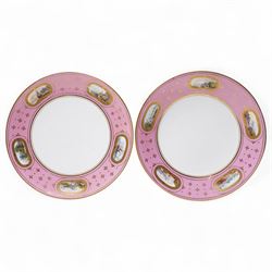 Pair of Victorian Minton plates, the pink borders painted with small landscape panels D24cm