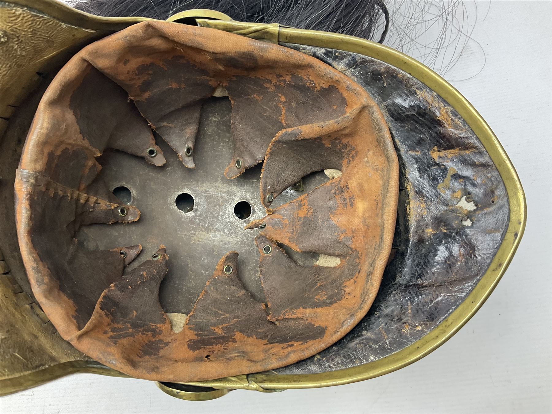 French 1874 Pattern Dragoon trooper's helmet with original liner and extra long criniere; stamped 10 DR with other numbers and Alexis Godilllo to the back of the helmet