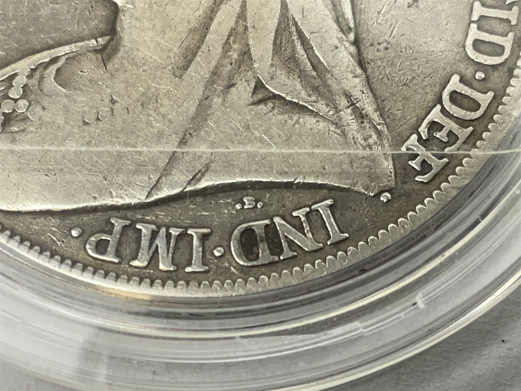 Charles I 1625 hammered silver sixpence, Queen Victoria 1894 crown coin and a cased hallmarked silver medal for the Hull photographic society, engraved '1940' 'Leonard Vokes', all housed in a red Pobjoy Mint coin box