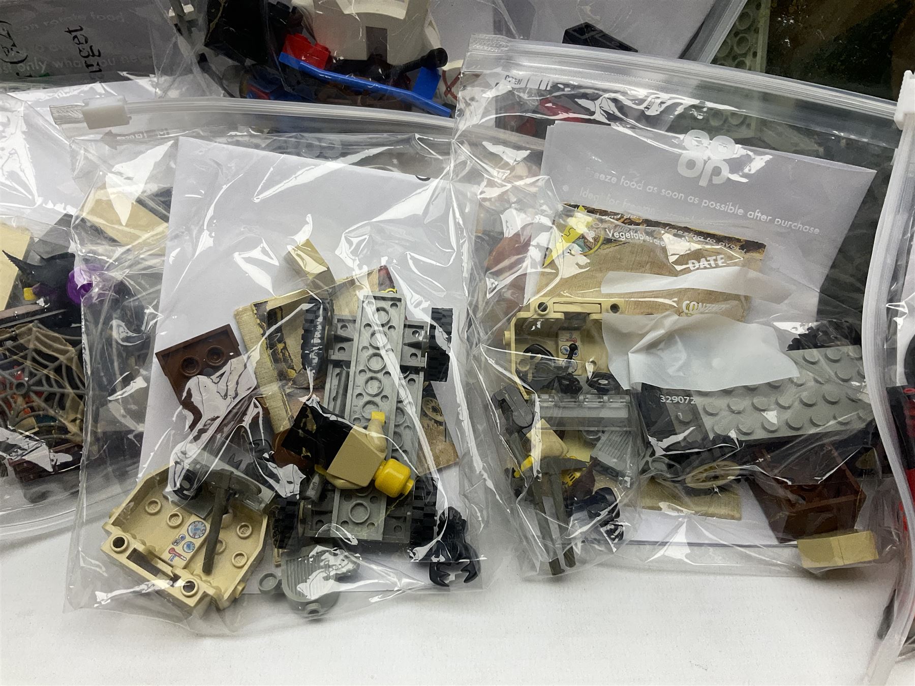 Lego - ten kits comprising Harry Potter Magic Mirror 4702; Extreme Team Rocket Car/Plane 6580; two Adventure Egypt Cars 5918; Adventure Egypt Bi-Plane 5928; Adventure Egypt Tombs and Car 5919 in golden Tutankamun box; Castle Knight with Horse & Cart 6016; Castle Witch & Fireplace 2872; Castle Robin Hood Hideout 6054; and Pirate Ship 6285; together with over 3.5kg of loose animals, characters and bricks etc; all unboxed