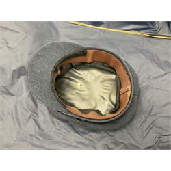 RAF Flight Lieutenant's uniform with peaked cap and WW2 ribbon bar; WW2 gas mask in blue canvas bag dated 1942; flying helmet date 1984; and British Army Major's uniform with Staybrite buttons and peaked cap