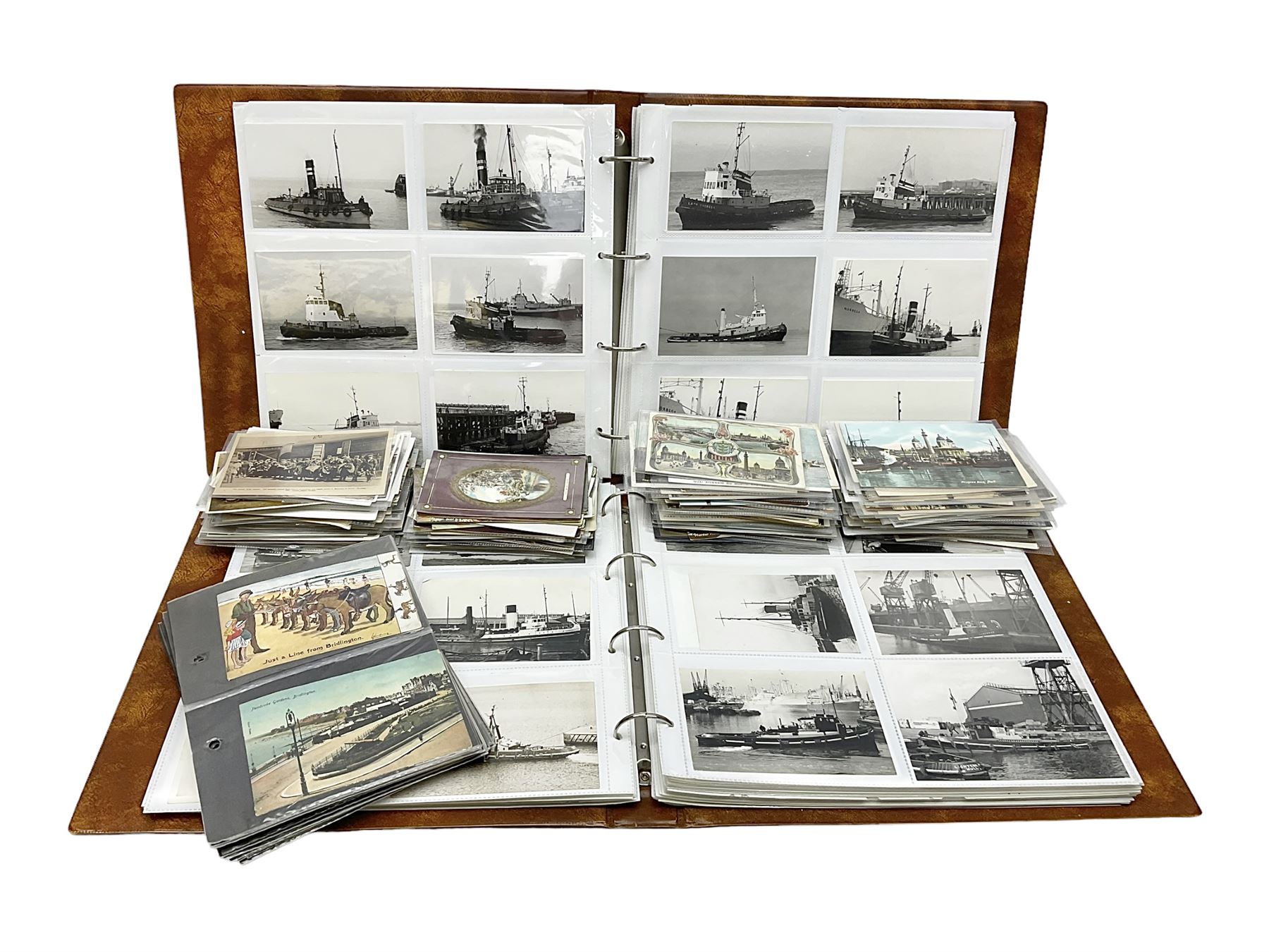 Collection of loose Edwardian and later postcards, mostly topographical examples depicting East Yorkshire, Hull and the East Coast, including Hull, Bridlington, Staithes, Flamborough Head, Beverley, etc., and a quantity of other postcards, plus two photograph albums containing photographs of trawlers