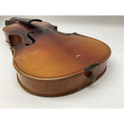 Czechoslovakian violin c1920 with 36cm two-piece maple back and ribs and spruce top, bears label 'Copy of Antonius Stradivarius Made in Czechoslovakia' L59cm; in carrying case; 1950s Czechoslovakian violin; and 195os Czechoslovakian three-quarter size violin; both cased (3)