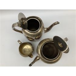 Elkington & Co. silver plate tea set, consisting teapot, coffee pot and milk jug, with engraved foliate decoration and a beaded edge