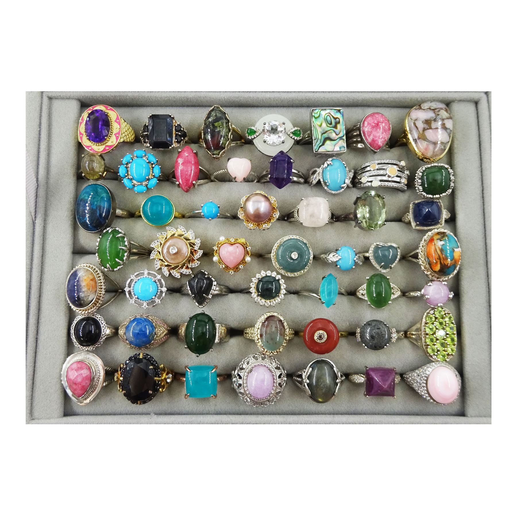 Fifty silver and silver-gilt stone set rings including labradorite, quartz, amazonite, kunzite, nephrite jade, jadeite, turquoise, amethyst, agate, aquaprase, topaz, morganite, pearl and amethyst