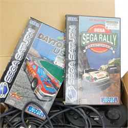 Sega Saturn games console, boxed with two games 'Daytona USA' and 'Sega Rally Championships'