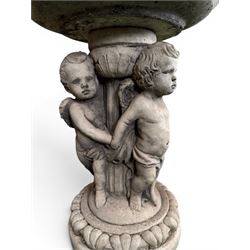Cast stone cherub bird bath, circular removable top raised on three cherubs with ornate detailing