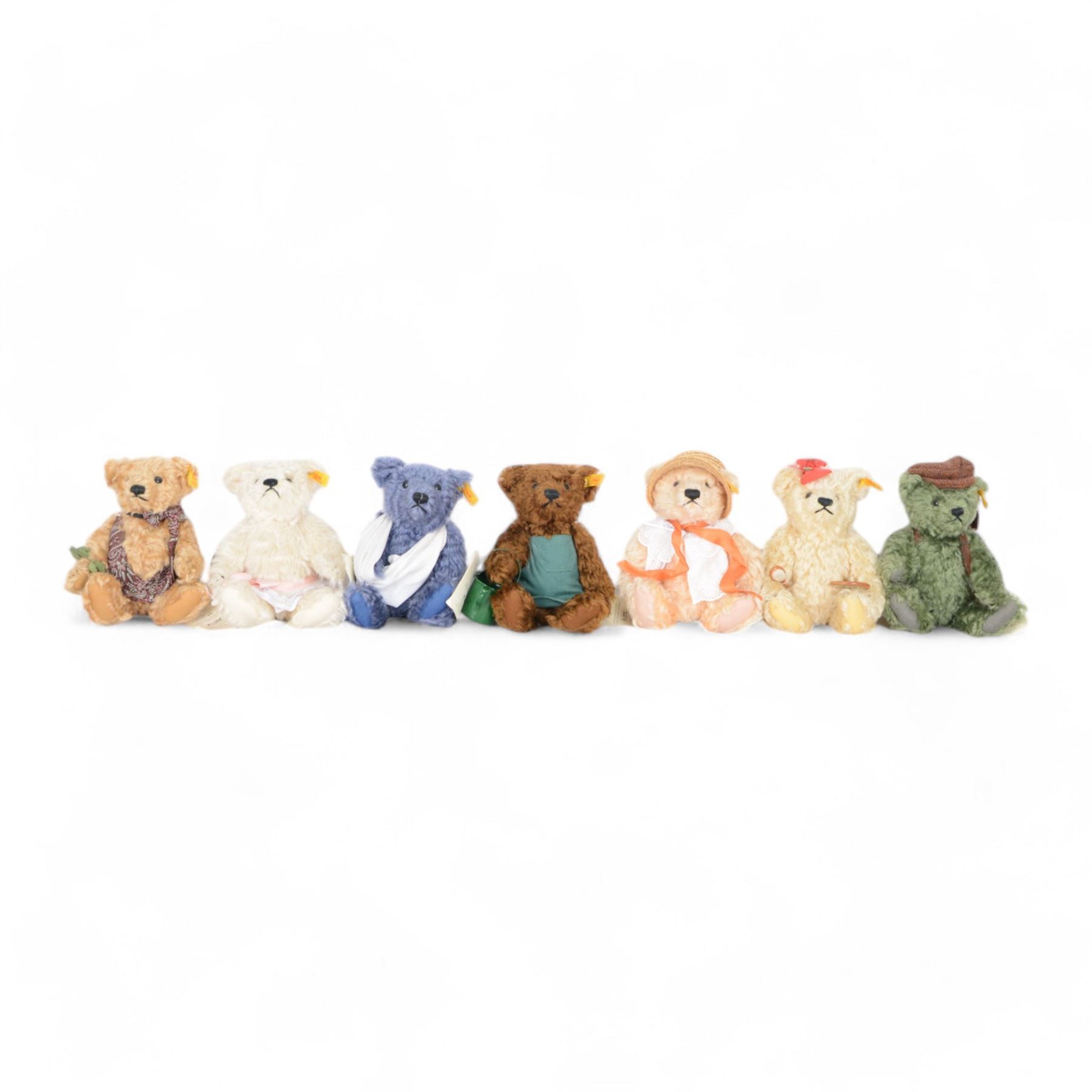 Set of seven Steiff Days of the Week Bears, issued by Danbury Mint, seven jointed bears with stitched noses, all dressed for a different day of the week, with Steiff button in ear and original tags, H24cm