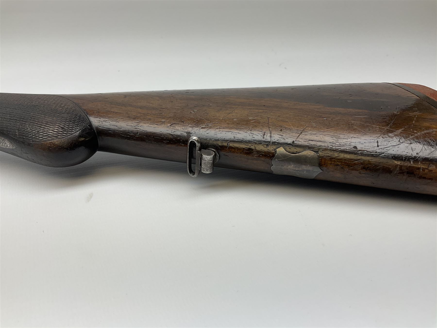 Lincoln Jeffries 12-bore side-by-side double barrel lightweight boxlock non-ejector sporting gun,  out-of-proof 66cm damascus barrels with sunken ribs, profusely engraved action, Prince of Wales walnut stock with chequered pistol grip and fore-end and thumb safety, sling swivels under barrel and stock, serial no.2139(?), L107.5cm overall RFD ONLY