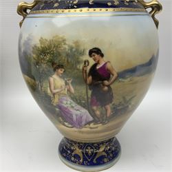 19th century Vienna style porcelain 'Musik' garniture, the central vase of baluster form with domed cover flanked by two smaller vases with twin curved gilt handles to short neck, each decorated with classical figural vignettes between blue borders heightened with gilt, H33.5cm