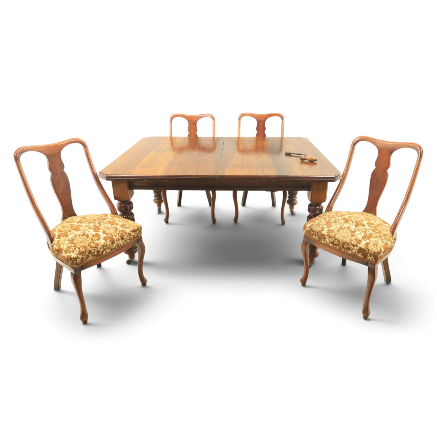 Victorian mahogany extending dining table and four chairs, rectangular top with moulded edge, extended to 198cm with additional leaf and winder, fluted and turned supports raised on castors, the chairs with swept frame and overstuffed seat, raised on cabriole front supports
