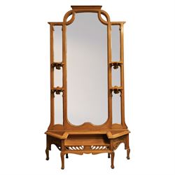 Art Nouveau oak hall mirror, the scrolling frame with large central bevelled mirror plate,...