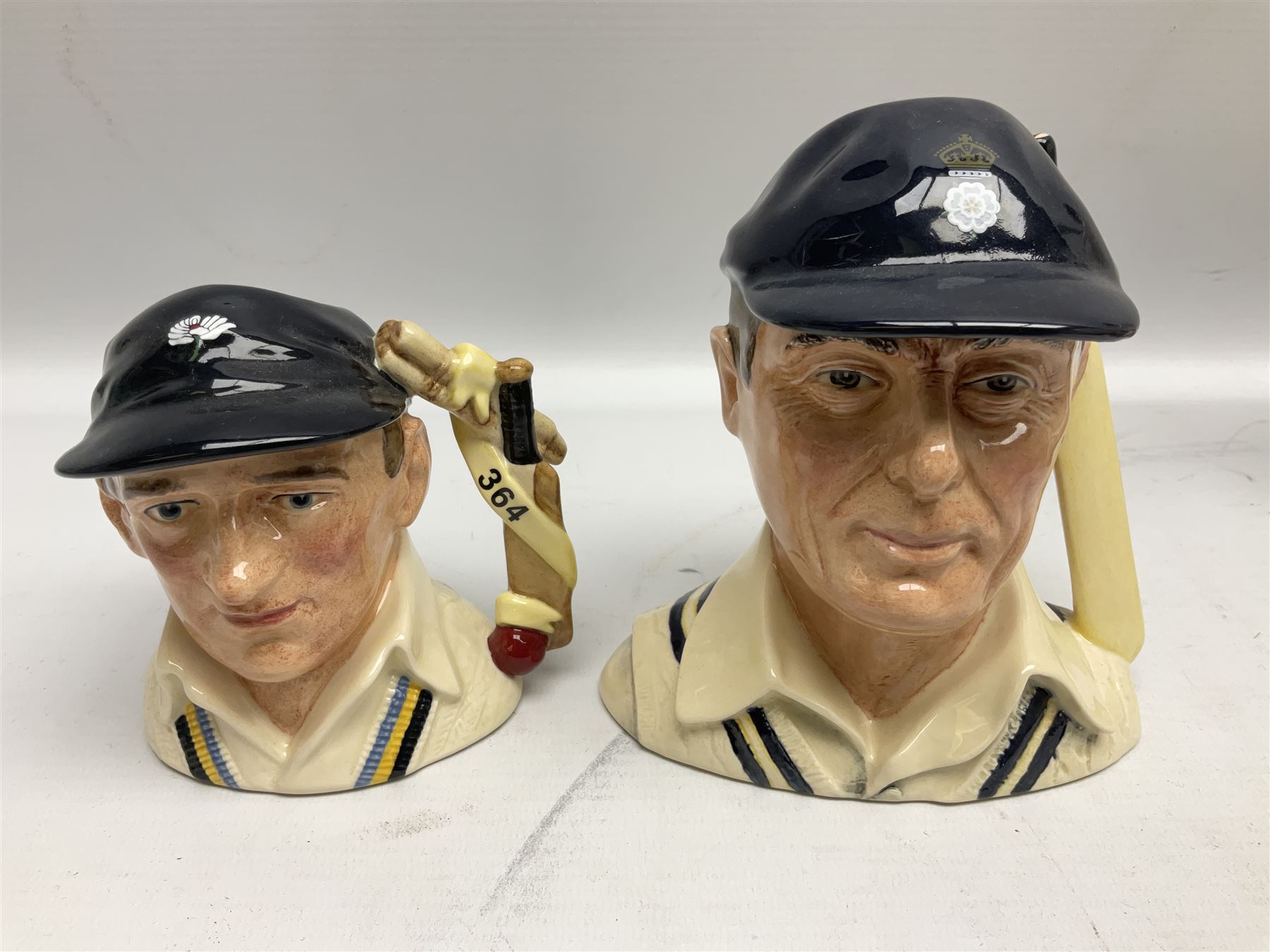 Royal Doulton limited edition figure of Geoffrey Boycott O.B.E, HN3890, no 253/8114, together with four Royal Doulton limited edition character jugs of cricket interest, comprising The Hampshire Cricketer D 6739, no 3903/5000, Freddie Trueman O.B.E, D 7090, no 502/9500, Brian Johnners Johnston, D 7018, no 1281/9500 and Len Hutton D 6945 no 263/9500, four with certificates, one with box