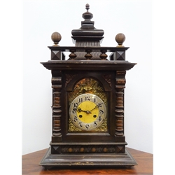  Large Edwardian stained and walnut architectural cased mantel clock with arched brass Roman dial, twin train movement half hour striking on a coil, H68cm  