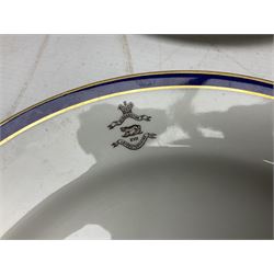 Collection of Regimental dinner wares, Comprising Royal Sussex; two dinner plates, two side plates and a soup bowl, Royal Leicestershire; two dinner plates, East Yorkshire Regiment side plate and Gordon Highlanders side plate, all decorated with the regiment's crests and blue and gilt boarders (9)