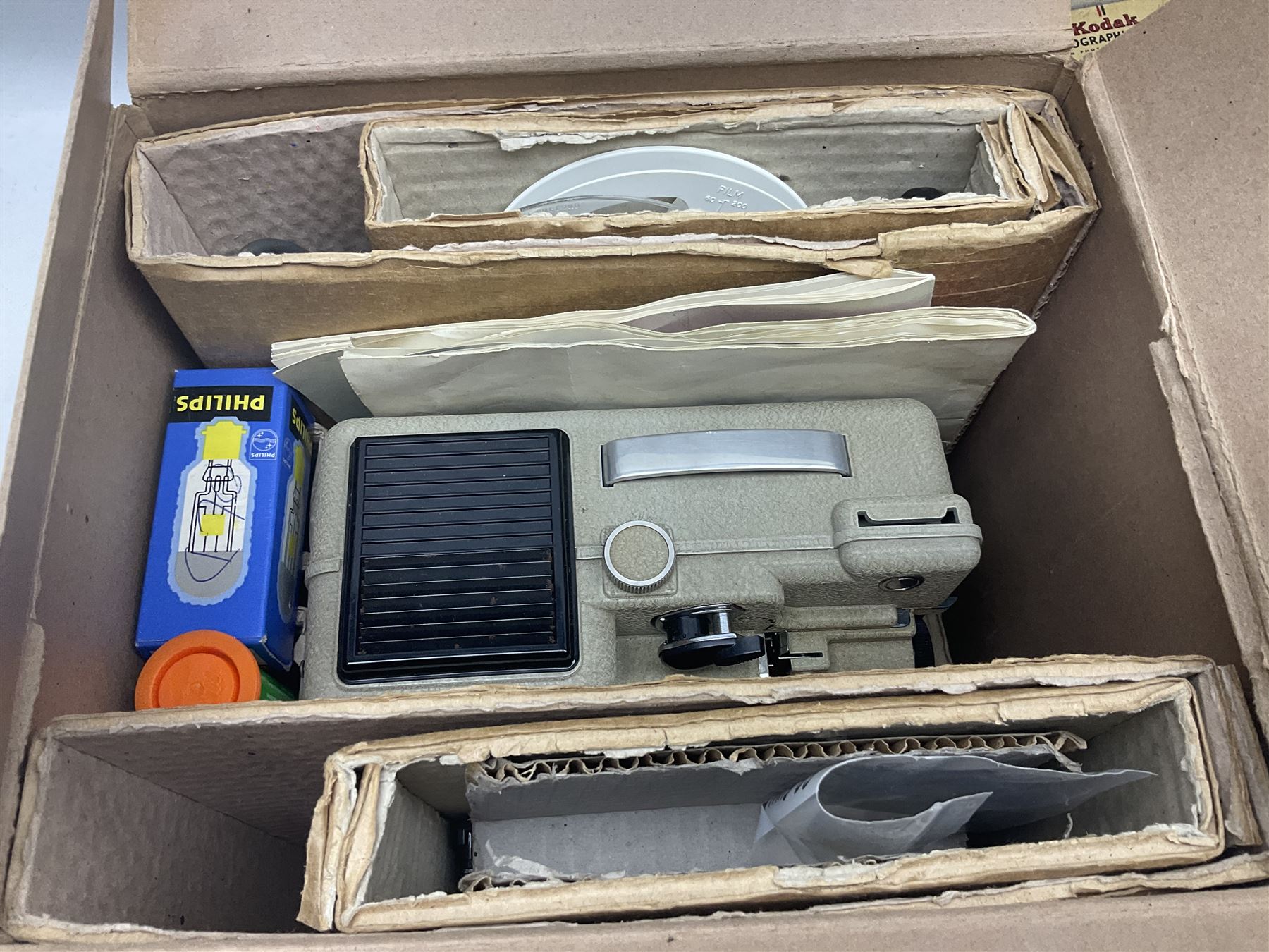 Large collection of projectors and equipment, to include Alphaxia Gnome projector, Kodak Brownie projector, slide containers, projector screen, etc, in six boxes