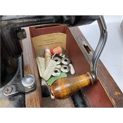 Singer sewing machine no. EA584046 in case (missing key) and Singer Manual of Family Sewing Machines