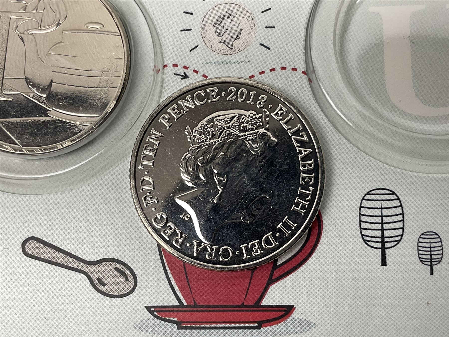 The Royal Mint 'The Great British Coin Hunt Quintessentially British A to Z' 2018 ten pence coin set, in card folder