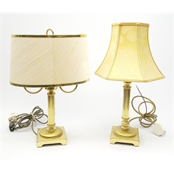 Two gilt table lamps, each with column modelled stem and shade, largest including shade H49cm. 