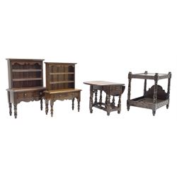 Collection of miniature furniture, two Welsh dressers with raised plate racks, four poster bed with lunette carved rails and a drop leaf dining table on turned supports