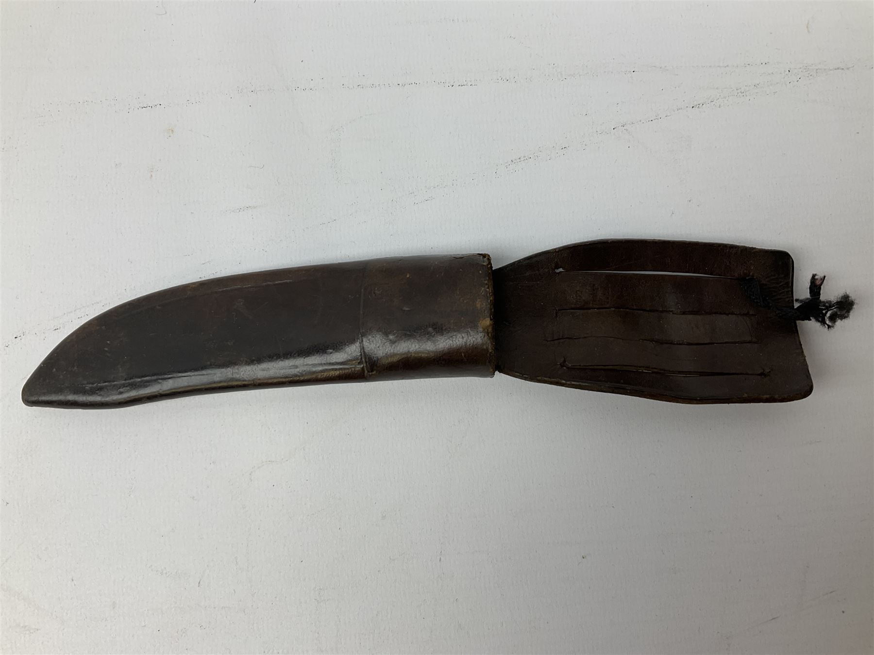 Three hunting knives, each blade marked A. Wright & Sons Sheffield, one with leather handle, one with horn handle and one with antler handle; each with leather sheath (3)