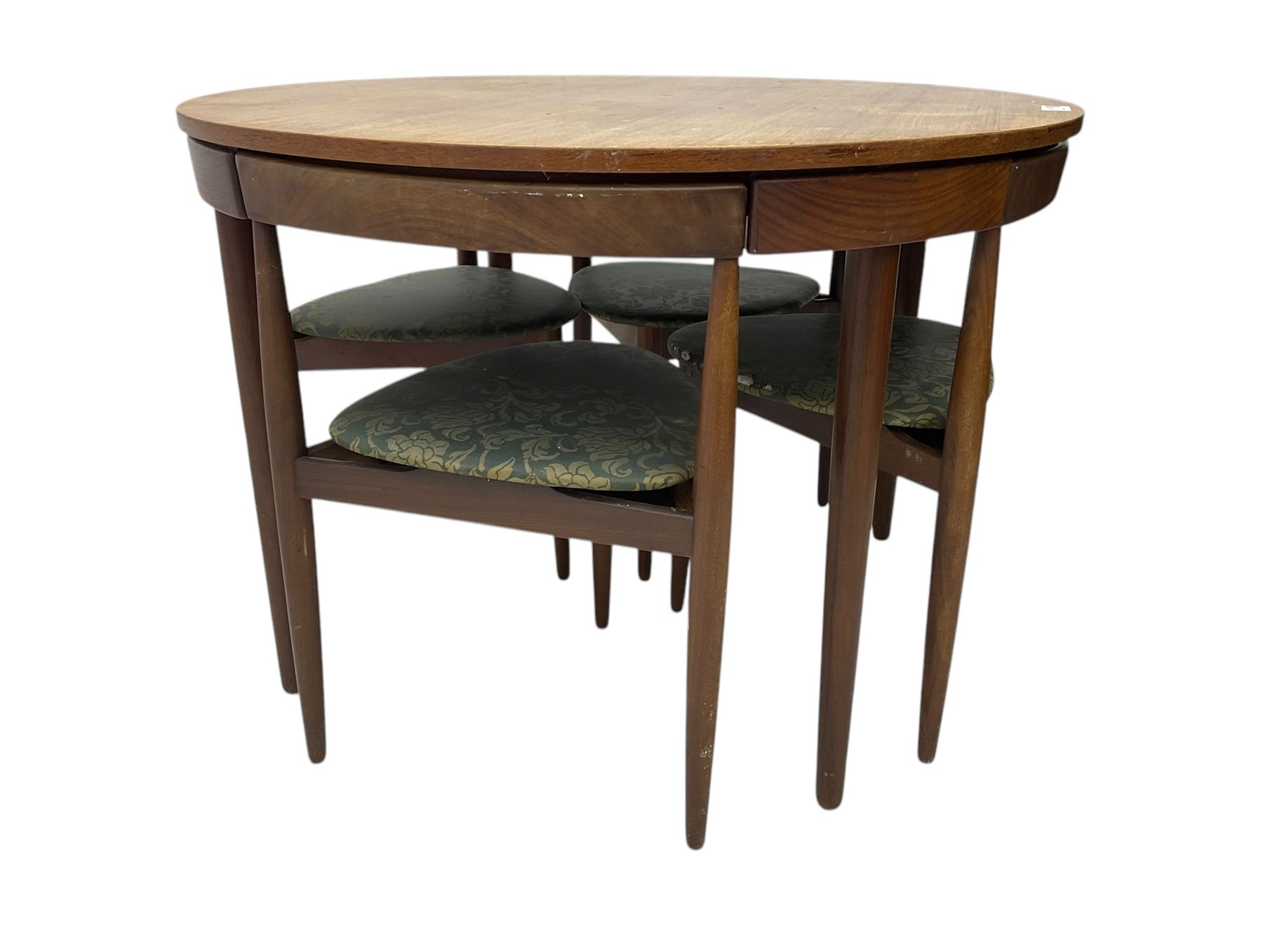 Hans Olsen for Frem Røjle - mid-20th century Danish teak 'Roundette' dining set, comprising a circular dining table raised on four tapering supports, paired with four matching chairs, each with a triangular seat upholstered in floral patterned fabric and raised on three tapering supports