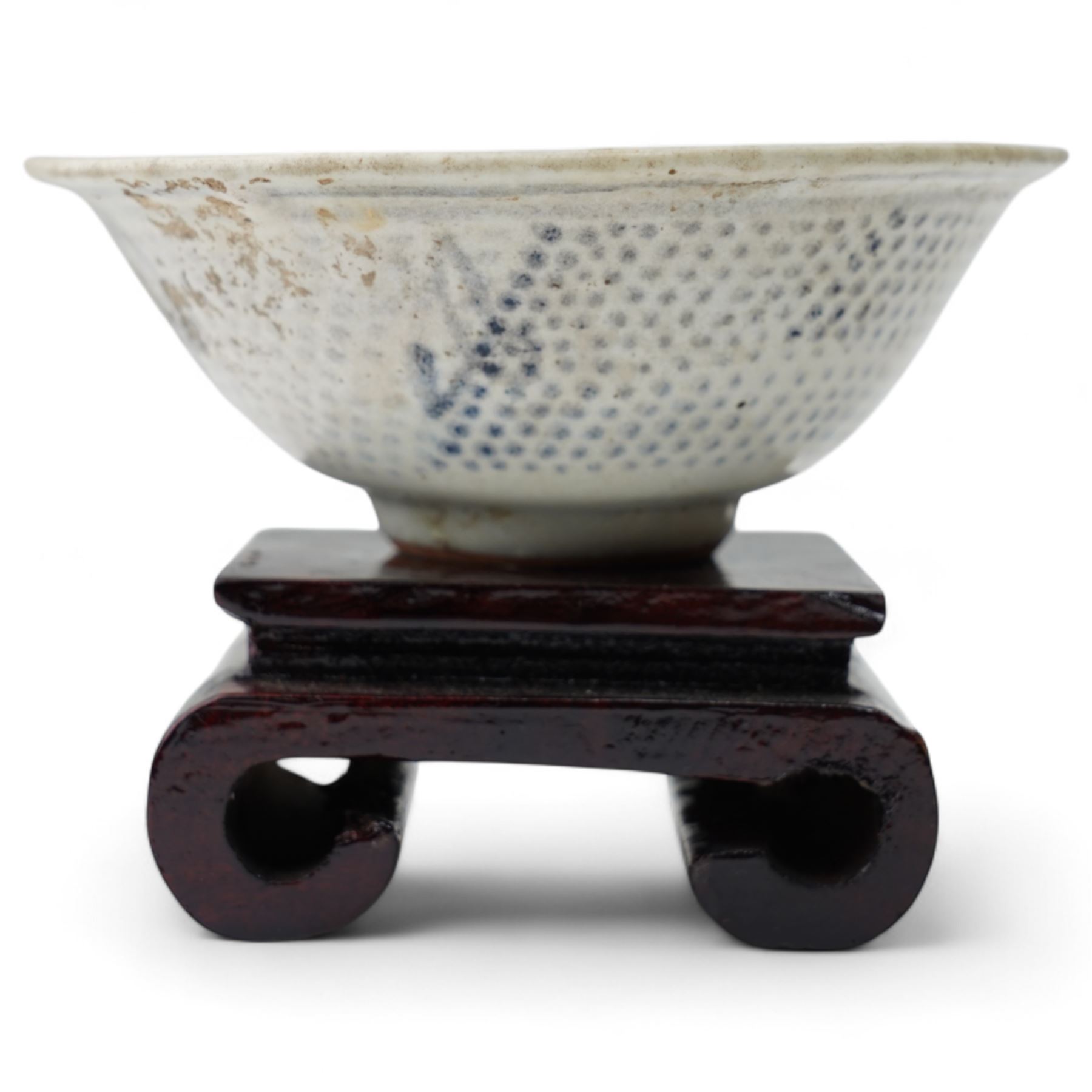 Chinese Early Ming Dynasty blue and white glazed bowl decorated with spotted pattern and central flower, c.1368AD-1644AD, D11cm; together with a small saucer with internal painted cockerel, D7cm (2)