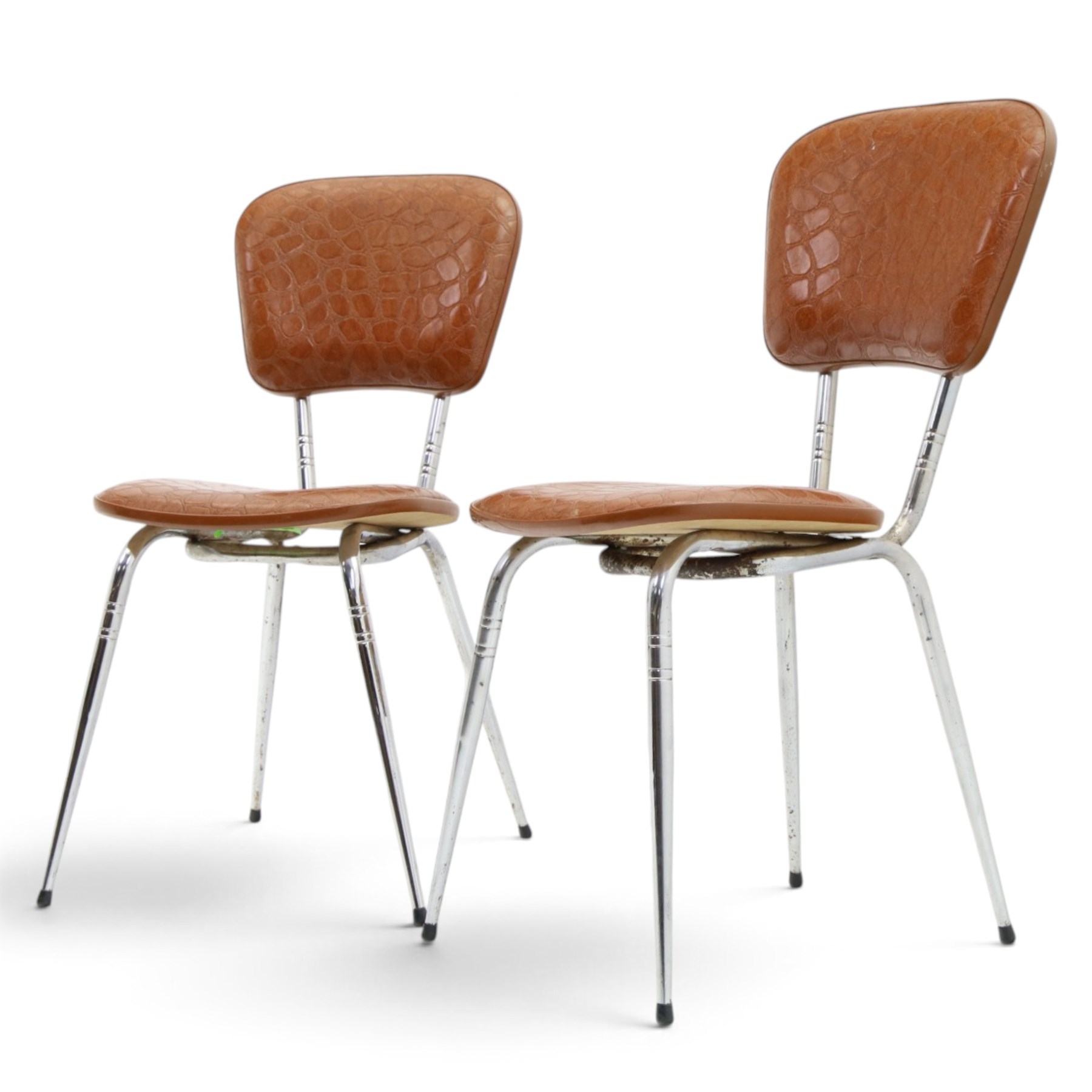 Pair of 20th century French chrome and crocodile effect bistro chairs, shaped padded back and seat upholstered in mock-croc faux leather on tapering chrome supports