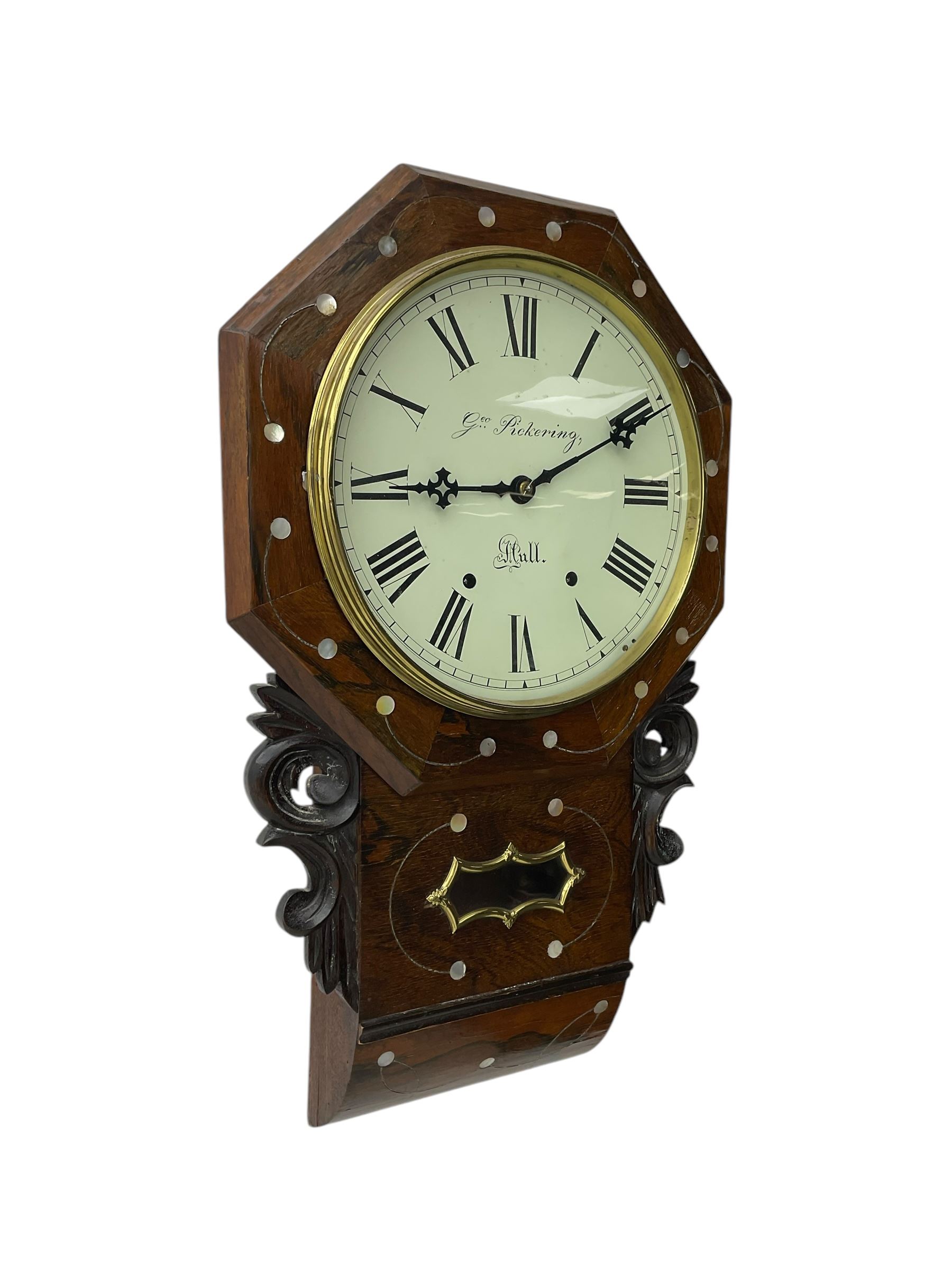 George Pickering of Hull - 8-day American mahogany and mother of pearl inlaid drop dial wall clock c 1880, with an octagonal dial surround and spun brass bezel, painted dial with Roman numerals, minute track, retailers name and Maltese cross hands, case with an ogee base, carved ears and pendulum viewing glass, twin train spring driven movement striking the hours on a bell.  With key and pendulum.