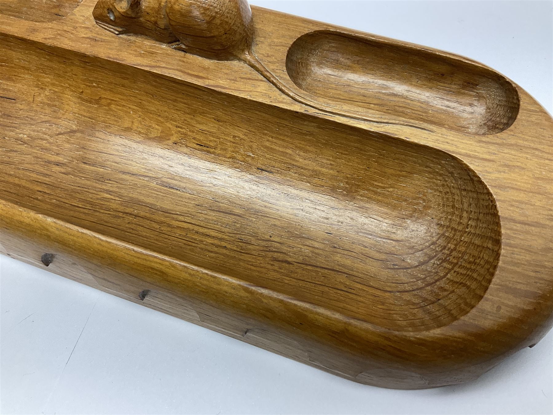 Mouseman - oak pen tray, rectangular form with rounded ends, carved mouse signature over penny moulded edge, by the workshop of Robert Thompson, Kilburn