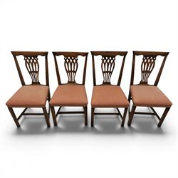 Set of eight George III dining chairs with padded seats, pierced vasiform splat, upholstered seat with brass trim, on square supports with H-stretcher