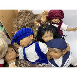 Quantity of vintage and later dolls to include unusual three faced example and further dolls marked C.J, Gloobee, Rosebud etc in three boxes