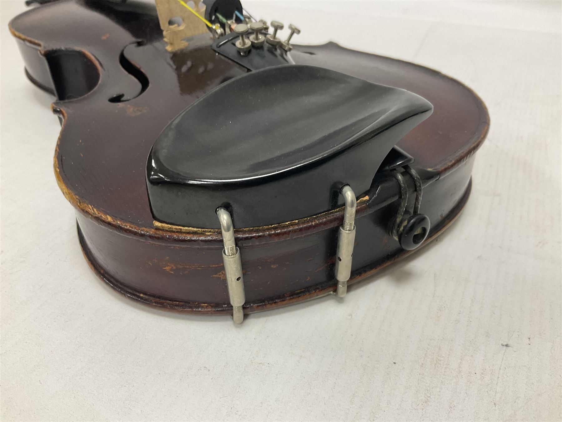 Neuner & Hornstiner early 20th century half size violin c1900, two piece maple back and ribs with a spruce top in a later ridged carrying case, no bow Length 57cm