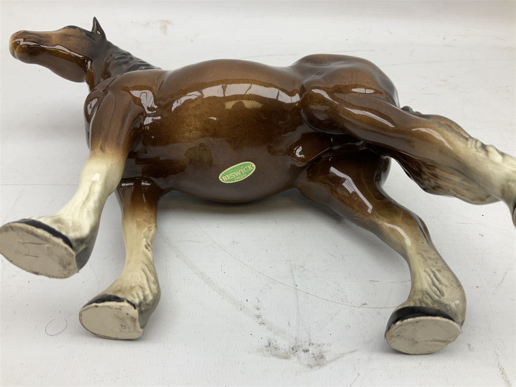 Seven Beswick figures of horses, including Connemara pony in grey no.1641, Arab in bay no.1265, large foal in grey no.947 etc, together with a Goebel figure of a horse (8)