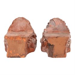 Pair of 19th century terracotta lion sash window rests, H18cm, L22cm
